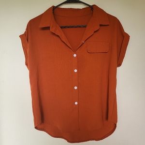 《Burnt orange button up top》